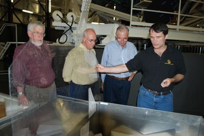 Bob Calder with a replacement mirror segment