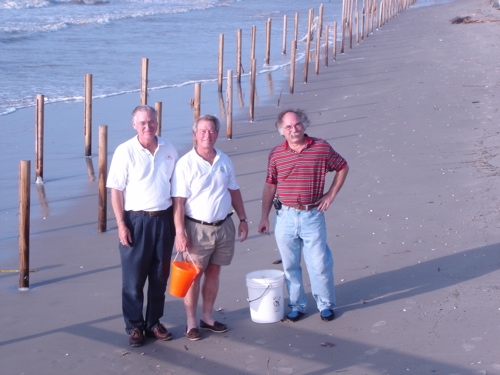 Rex Ross, Richard Domercq, and Richard Alexander surveying Hurricane Rita