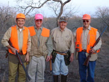 Quail hunters posing for a group photo