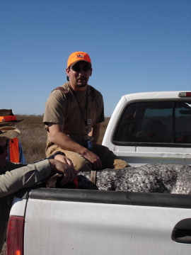 Robert taking a break with the hunting dogs
