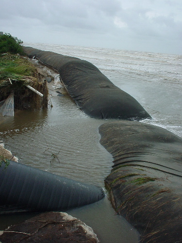 Dune-sock and drainage damage after Claudette